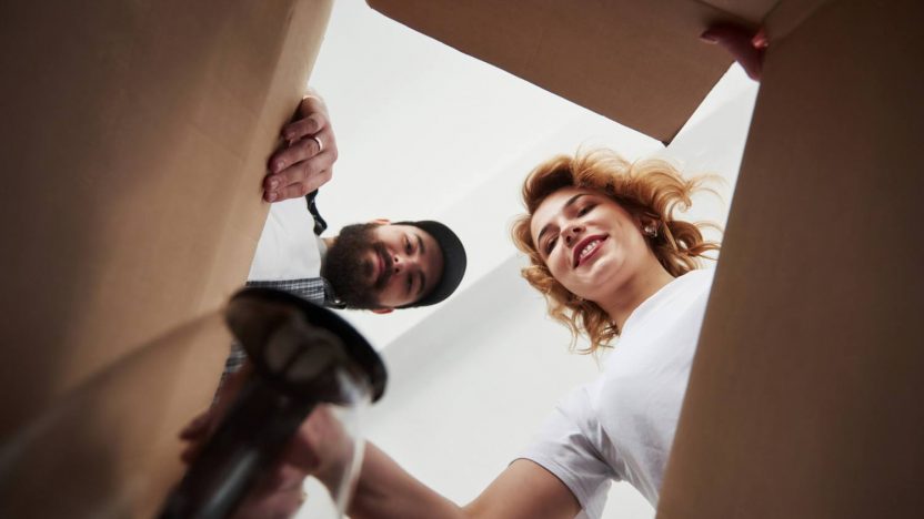 couple moving in box